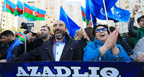 The participants of the rally of  the "Musavat" Party in Baku. An inscription on a poster: "Freedom". October 25, 2015. Photo by Aziz Karimov for the "Caucasian Knot"