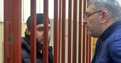 Zaur Dadaev (to the left) and an advocate Shamsudin Tsakaev in the courtroom. Moscow, November 23, 2015. Photo by Yuliya Buslavskaya for "Caucasian Knot" Zaur Dadaev (to the left) and an advocate Shamsudin Tsakaev in the courtroom. Moscow, November 23, 2015. Photo by Yuliya Buslavskaya for "Caucasian Knot"