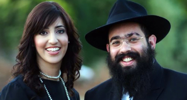 Ari Edelkopf, Chief Rabbi of Sochi, and his wife. Photo: https://www.facebook.com/photo.php?fbid=100135029997986&set=ecnf.100000044671868&type=3&theater Ari Edelkopf, Chief Rabbi of Sochi, and his wife. Photo: https://www.facebook.com/photo.php?fbid=100135029997986&set=ecnf.100000044671868&type=3&theater