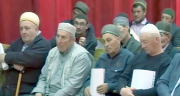 Imams in KChR are listening to the instructions on the ban on expensive mourning ceremonies. Screenshot of a footage on the the "Karachaevo-Cherkessia" television and radio company, Youtube.com/watch?v=Sj0dHoL-4D8 Imams in KChR are listening to the instructions on the ban on expensive mourning ceremonies. Screenshot of a footage on the the "Karachaevo-Cherkessia" television and radio company, Youtube.com/watch?v=Sj0dHoL-4D8