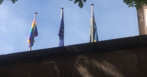 An LGBT flag among other flags near the building of the British Embassy in Yerevan. Armenia, May 2017. Screenshot of a video https://www.youtube.com/watch?v=MfMLrlgiaLM
