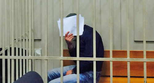 Defendant Shagid Gubashev closes his face. Photo by the 'Caucasian Knot' correspondent. 