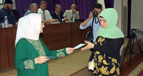 Ceremony of handing over genetic passports in Chechnya. Photo: https://chechnyatoday.com/content/view/305687'