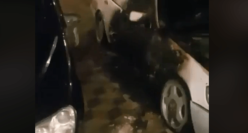 Mercedes cars damaged by the remnants of the explosion of a grenade in the yard of the Khazbiev family's house. Photo: screenshot of the video, https://www.facebook.com/hazbiev.m/videos/1797762940282488