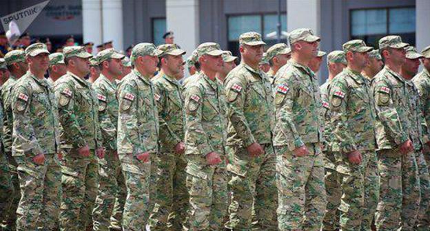 Georgian militaries. Photo © Sputnik / Alexander Imedashvili
https://sputnik-georgia.ru/politics/20180207/239217378/Voennaja-reforma-v-Gruzii-prezidentu-dali-pravo-objavljat-mobilizaciju.html