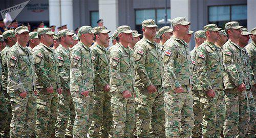 Georgian militaries. Photo © Sputnik / Alexander Imedashvili
https://sputnik-georgia.ru/politics/20180207/239217378/Voennaja-reforma-v-Gruzii-prezidentu-dali-pravo-objavljat-mobilizaciju.html