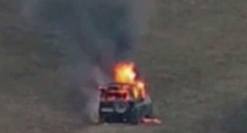 A car is on fire in conflict zone. Photo: https://mod.gov.az/ru/foto-arhiv-045/
