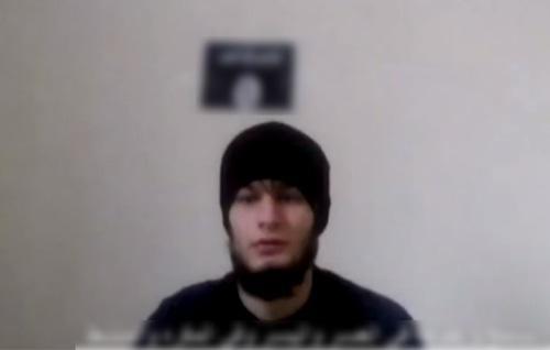 A militant who attacked the police officer in Grozny has sworn allegiance to the Islamic State banned in Russia. Screenshot of a video https://web.telegram.org/#/im?p=@directorate4