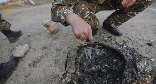 Hadrut, Nagorno-Karabakh. The Smerch system shell holes © Sputnik/ Asatur Yesayants https://ru.armeniasputnik.am/columnists/20180402/11219983/krichashchaya-tishina-aprelskoj-vojny-v-karabahe-chto-bylo-za-liniej-fronta.html