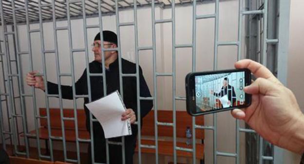 Oyub Titiev in the court room. Photo by the Human Rights Centre "Memorial" Oyub Titiev in the court room. Photo by the Human Rights Centre "Memorial"