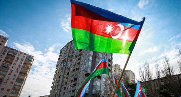 The flag of Azerbaijan at the rally. Photo by Aziz Karimov for the "Caucasian Knot" The flag of Azerbaijan at the rally. Photo by Aziz Karimov for the "Caucasian Knot"