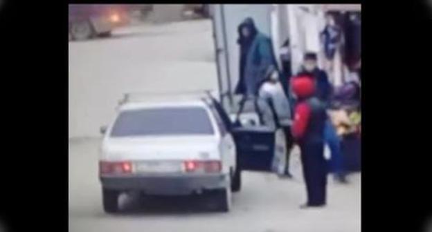 Teenager near the car. Screenshot from video posted by Nurmagomeg Astarkhanov,
https://www.youtube.com/watch?time_continue=34&v=A8kHYg7CJlU
Teenager near the car. Screenshot from video posted by Nurmagomeg Astarkhanov,
https://www.youtube.com/watch?time_continue=34&v=A8kHYg7CJlU