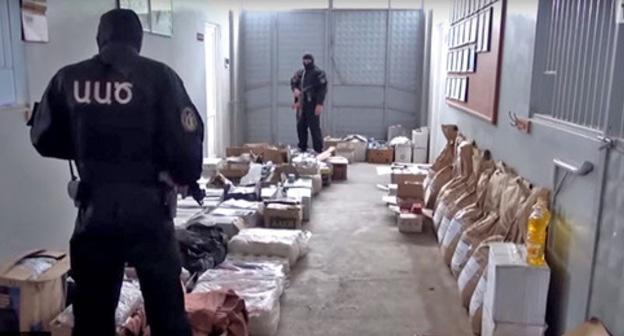 Search in a summer cottage of Manvel Grigoryan, head of the "Erkrapa" Volunteer Union, in Nagorno-Karabakh. Screenshot from video Armenian Public TV https://www.youtube.com/watch?time_continue=91&v=aqwuHxq1yYM