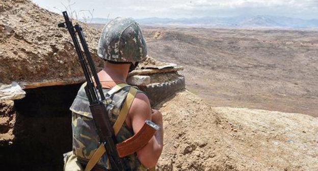 Soldier of Nagorno-Karabakh Army at contact line. Photo: © Sputnik / Aram Nersesyan https://ru.armeniasputnik.am/karabah/20180817/13916268/azerbajdzhanskaya-diversiya-v-karabahe-nastuplenie-otrazheno.html Soldier of Nagorno-Karabakh Army at contact line. Photo: © Sputnik / Aram Nersesyan https://ru.armeniasputnik.am/karabah/20180817/13916268/azerbajdzhanskaya-diversiya-v-karabahe-nastuplenie-otrazheno.html