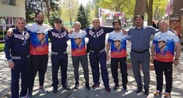 Members of the Georgian national freestyle wrestling team wearing Russian Tri-color T-shirts. Photo: RFE/RL Members of the Georgian national freestyle wrestling team wearing Russian Tri-color T-shirts. Photo: RFE/RL