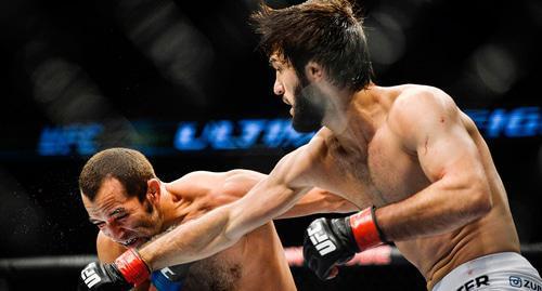 Zubair Tukhugov (from the right) during his featherweight fight with Ernest Chavez of USA at the Ultimate Fighting Championship (UFC) gala at the Globe Arena in Stockholm, October 4, 2014. Photo: REUTERS / Anders Wiklund