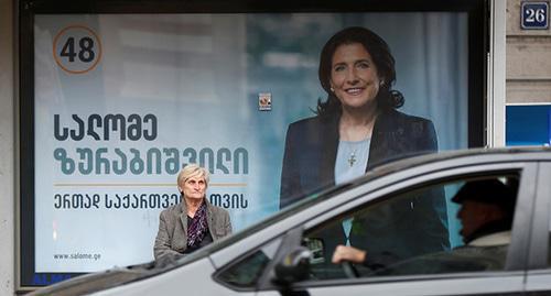Election campaign poster with Salome Zurabishvili's portrait in Tbilisi, October 2018. Photo:  REUTERS/David Mdzinarishvili
