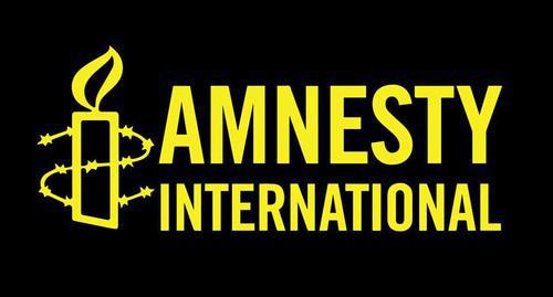 Logo of the human rights organization "Amnesty International". Photo https://amnesty.org.ru/tags/россия/