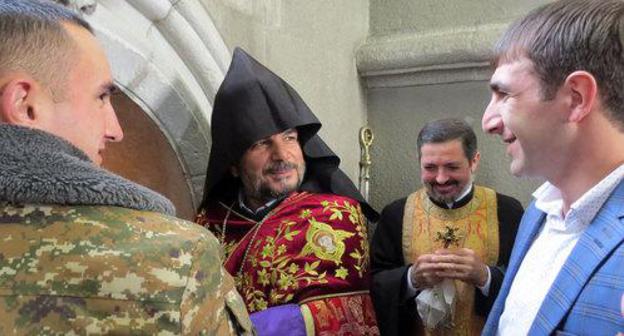 A procedure for christening at the Cathedral of Holy Christ the Saviour in the city of Shushi. Photo by Alvard Grigoryan for the "Caucasian Knot" A procedure for christening at the Cathedral of Holy Christ the Saviour in the city of Shushi. Photo by Alvard Grigoryan for the "Caucasian Knot"