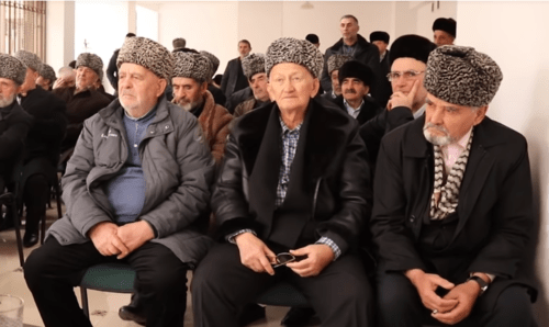 Members of the Council of Teips of the Ingush People listening to the "Appeal to the leadership and people of the Chechen Republic". Screenshot from the video appeal dated December 7 2018. https://youtu.be/waLyRPxTXQM