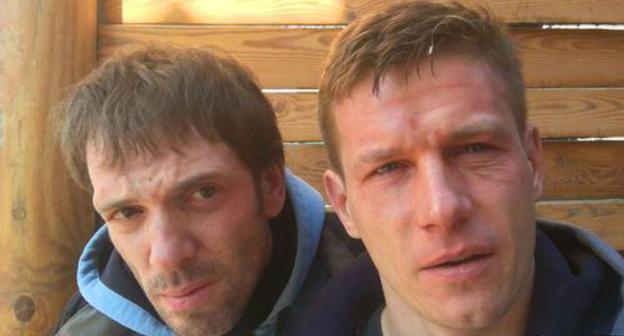 Andrei Kostyanov and Sergey Khazov-Kassia after being attacked. Photo: RFE/RL