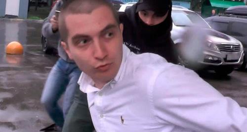 Detention of Georgy Guev, a native of North Ossetia. Screenshot of the video by TASS https://www.youtube.com/watch?v=yYQEb5nf0Iw&amp;feature=youtu.be