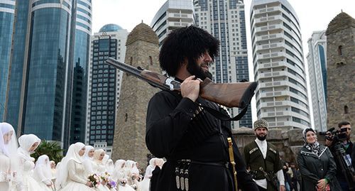 A man in Chechen traditional dress at the wedding ceremony. Grozny, October 2018. Photo: REUTERS/Said Tsarnayev