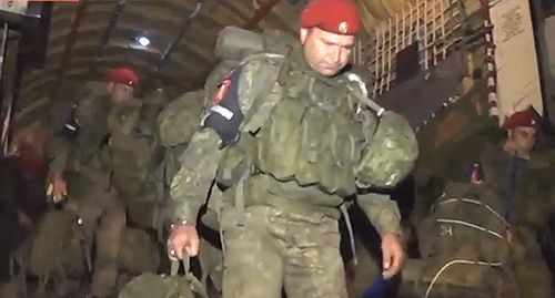 Fighters of the military police unit stationed in Chechnya arrive on the Syrian-Turkish border. Screenshot from TV story presented by 'Zvezda' TV Channel: https://tvzvezda.ru/news/forces/content/20191025429-pglRb.html