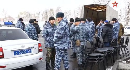 Participants of the funeral ceremony for the killed Ibragim Eldjarkiev and his brother. Screenshot from video posted by ‘Zvezda’ TV Company at: http://tvzvezda.ru/news/vstrane_i_mire/content/20191141241-pEyUQ.html