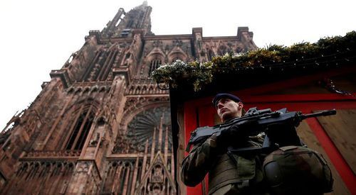 An armed French soldier near the Strasbourg Cathedral. Photo: REUTERS / Christian Hartmann