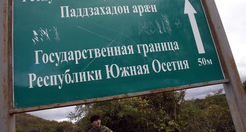 South Ossetia border signpost. REUTERS/David Mdzinarishvili