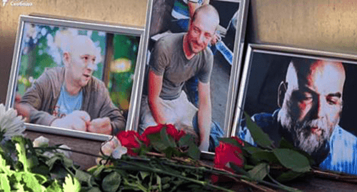 Funeral photos of journalists Orkhan Djemal, Alexander Rastorguev and Kirill Radchenko. Screenshot from video posted at: https://www.youtube.com/watch?v=5hwZkvS0U90