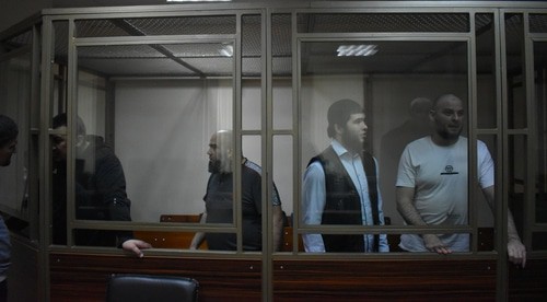 Ilsur Amangaziev, Uveis Nimatulaev, Khasan Kitiev and Georgy Yusupov (from left to right) in the courtroom. Photo by Konstantin Volgin for the Caucasian Knot