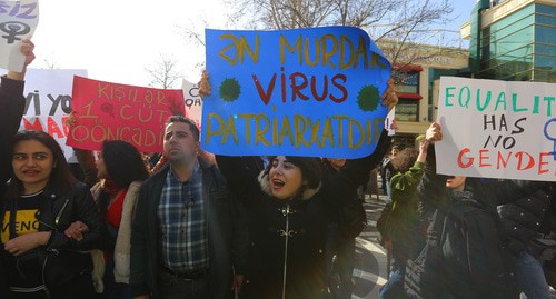 A poster saying, "Patriarchy is the most disgusting virus". Photo by Aziz Karimov for the "Caucasian Knot"
