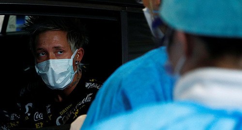A man wearing a medical mask. Photo: REUTERS/Francois Lenoir