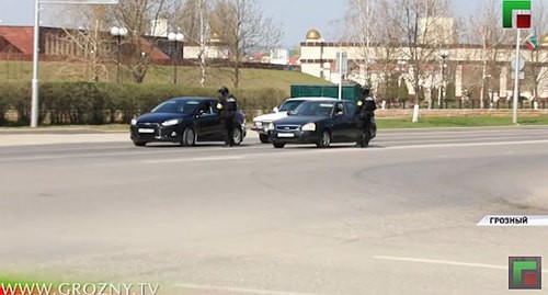 Law enforcers in Grozny. Screenshot of the video by the Grozny TV channel https://www.youtube.com/watch?v=Dq-Sv8HPfjo