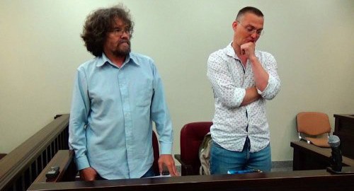 Andrei Rudomakha and Mikhail Benyash listening to the court ruling over illegal issuing of a search warrant of the "Ecowatch" premises. Photo: press service of the "Ecowatch", http://ewnc.org/node/28175.