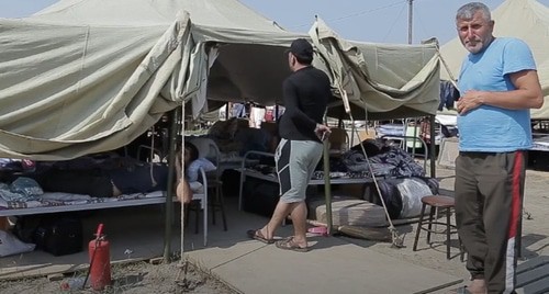 Azerbaijanis staying in the Kullar tent camp. Screenshot from the Caucasian Knot video: https://www.youtube.com/watch?time_continue=110&v=11hN-YEmPIg&feature=emb_logo