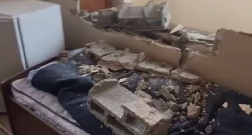 Wall of a building destroyed as a result of shelling attack on Stepanakert. Screenshot from the video posted by the Caucasian Knot