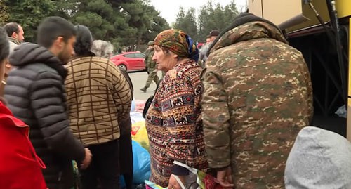 People are returning to Nagorno-Karabakh accompanied by the Russian peacekeepers. Screenshot from the Caucasian Knot video: https://www.youtube.com/watch?v=y5xgtPDxz-g