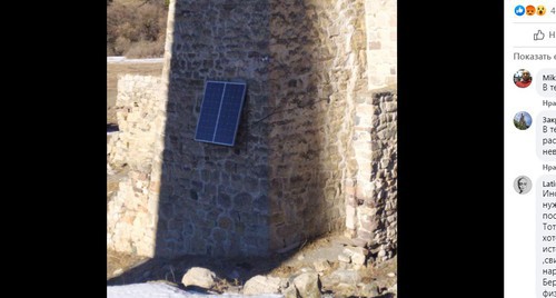 Solar panels installed on a historic tower in the mountains of Ingushetia. Screenshot of the post on Khanifa Ozdoeva's Facebook https://www.facebook.com/photo?fbid=408602777030855&amp;set=a.113987936492342