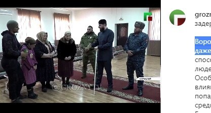 Adam Elzhurkaev, a theologian, is scolding three Kurchaloi women detained by law enforcers for providing occult services. Screenshot: https://www.instagram.com/p/CL40Ok0puL1/