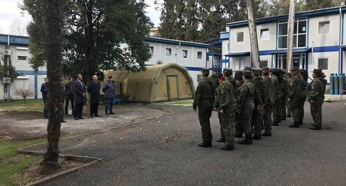 A regiment in the territory of the Russian mobile hospital in Sukhumi. Photo by the press service of Coordination Council of Organizations of Russian Compatriots (KSORS) https://ksors.ru/ksors-pozdravil-sotrudnic-voennogo-gospitalya-mo-rf-s-8-marta/"