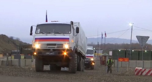 Soldiers escort a convoy of trucks in Nagorno-Karabakh. Photo by the press service of the Russian Ministry of Defence http://mil.ru/russian_peacekeeping_forces/news/more.htm?id=12348295@egNews