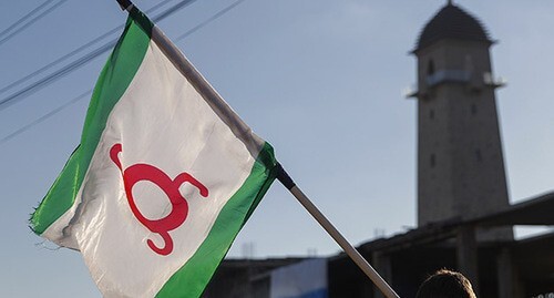 A flag held by a participant of the rally in Magas, October 2018. Photo: REUTERS/Maxim Shemetov