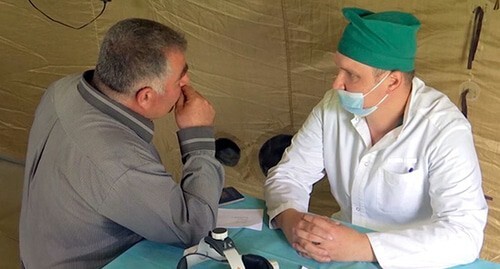 Military doctor and local resident in the village of Aknaberd of the Shaumyan District of Nagorno-Karabakh. Photo courtesy of the press service of the Russian Ministry of Defence