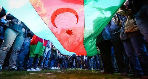 The flag of Azerbaijan at a protest action. Photo by Aziz Karimov for the "Caucasian Knot"