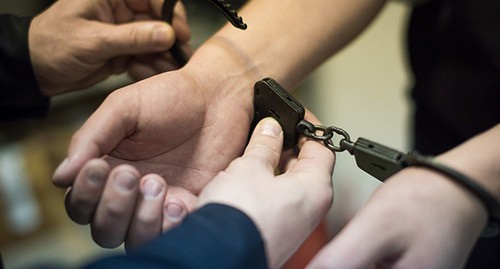 Handcuffs. Photo courtesy of Elena Sineok / Yuga.ru