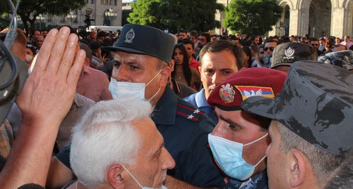 Participants of a protest action and police officers in Yerevan. Photo by Tigran Petrosyan for the "Caucasian Knot"