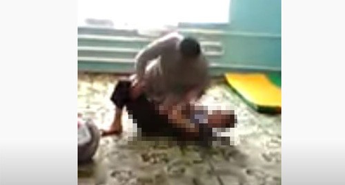 Screenshot of a video of child abuse at a boarding school for mentally retarded children in Ingushetia https://www.youtube.com/watch?v=ZO38aWNwJqM